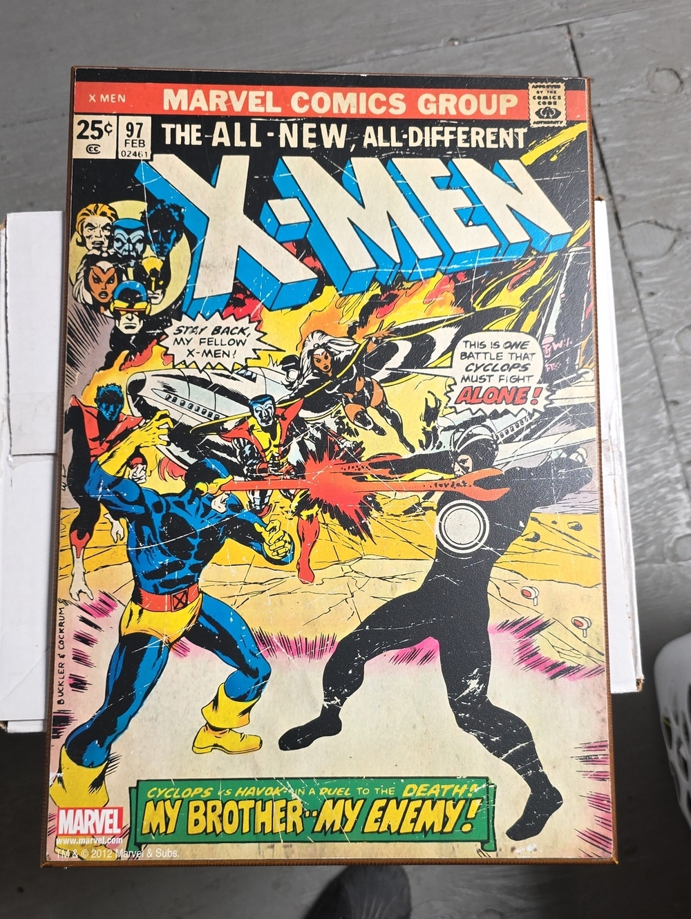 Marvel X-Men Comic Cover in Blue, Yellow, Red and Black